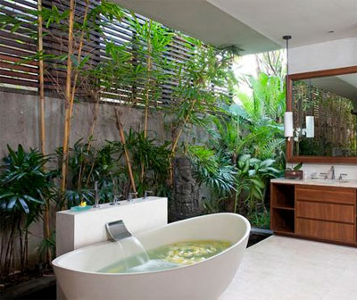 Bathroom with Wall of Palm Trees and Plants