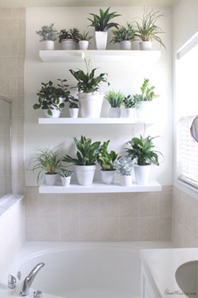 White Floating Bathroom Shelves Above Tub